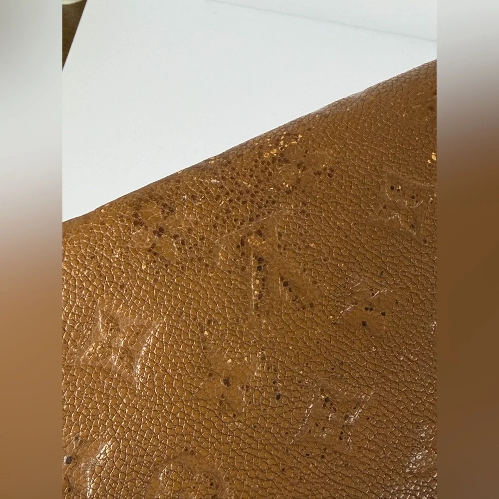 Louis Vuitton Virtuose Wallet Crafted Brown Monogram Empreinte Leather